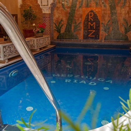 Riad Merzouga Marrakesh Exterior photo The swimming pool