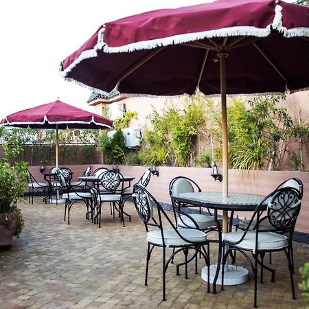 Riad Merzouga Marrakesh Exterior photo Rooftop terrace