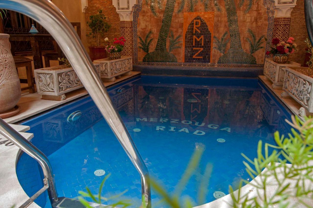 Riad Merzouga Marrakesh Exterior photo The swimming pool