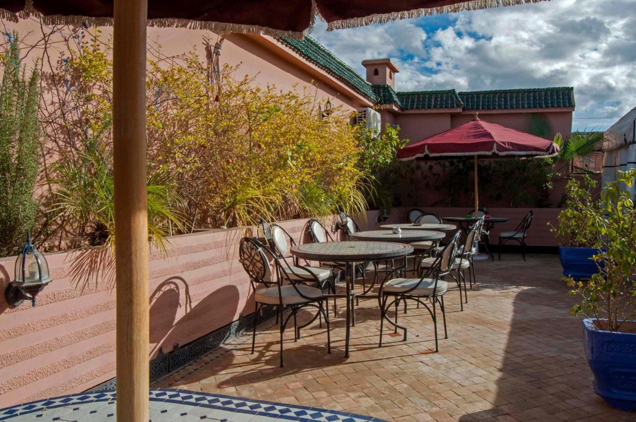 Riad Merzouga Marrakesh Exterior photo Roof terrace of a riad in Marrakech