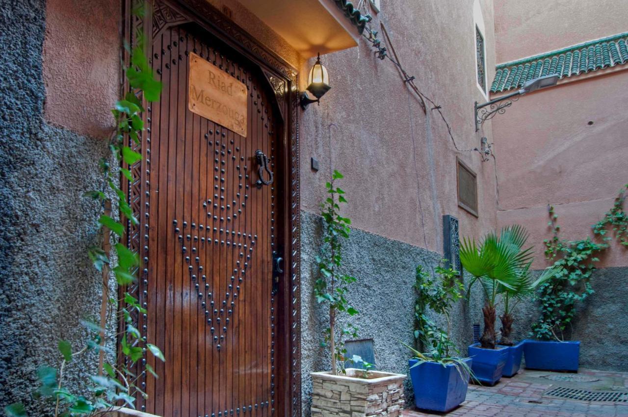 Riad Merzouga Marrakesh Exterior photo Door of the Riad