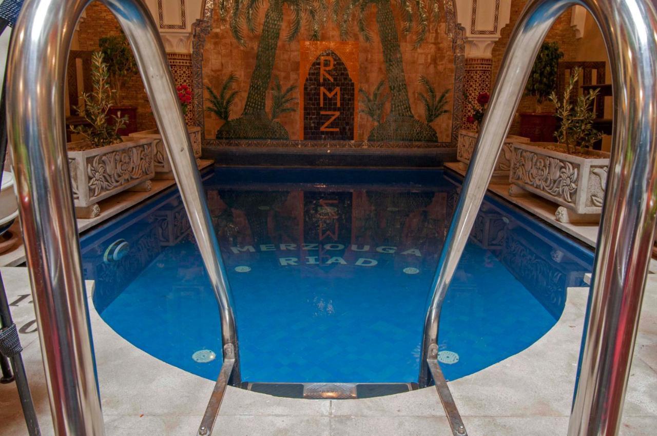 Riad Merzouga Marrakesh Exterior photo The swimming pool
