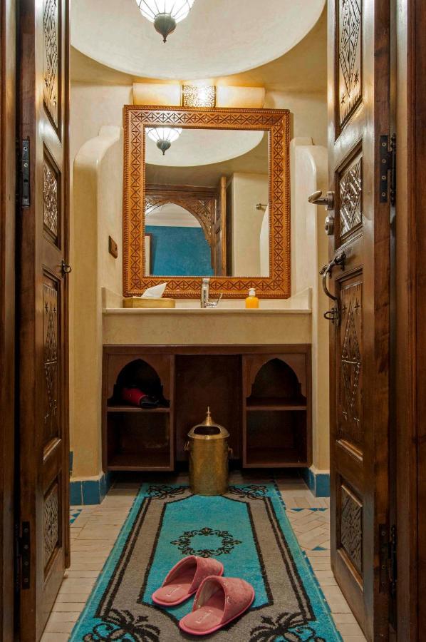 Riad Merzouga Marrakesh Exterior photo Bathroom in a Moroccan hammam