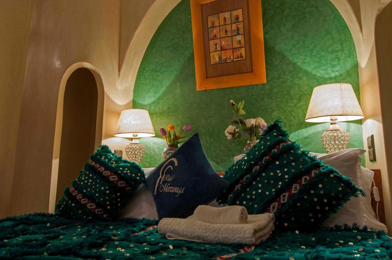 Riad Merzouga Marrakesh Exterior photo A Moroccan hotel room