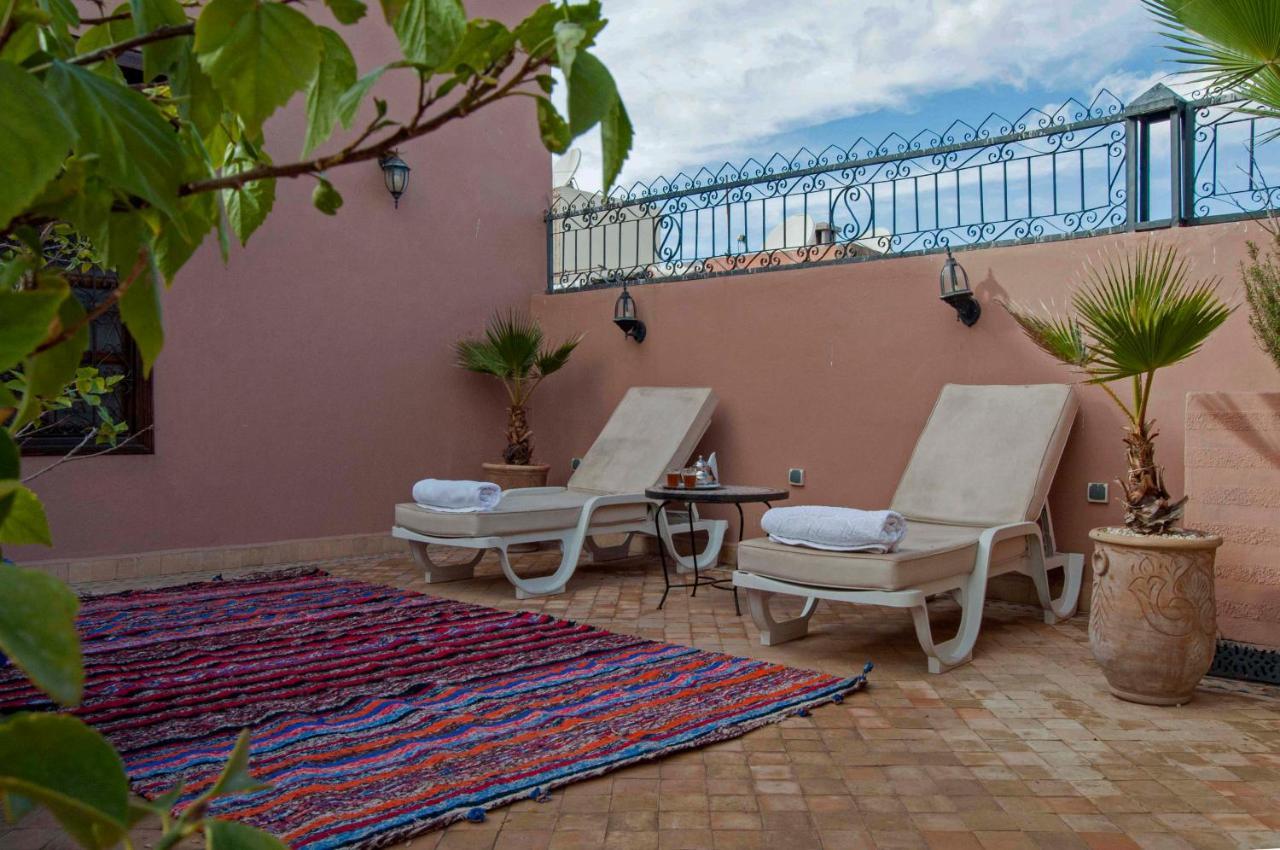 Riad Merzouga Marrakesh Exterior photo Roof terrace